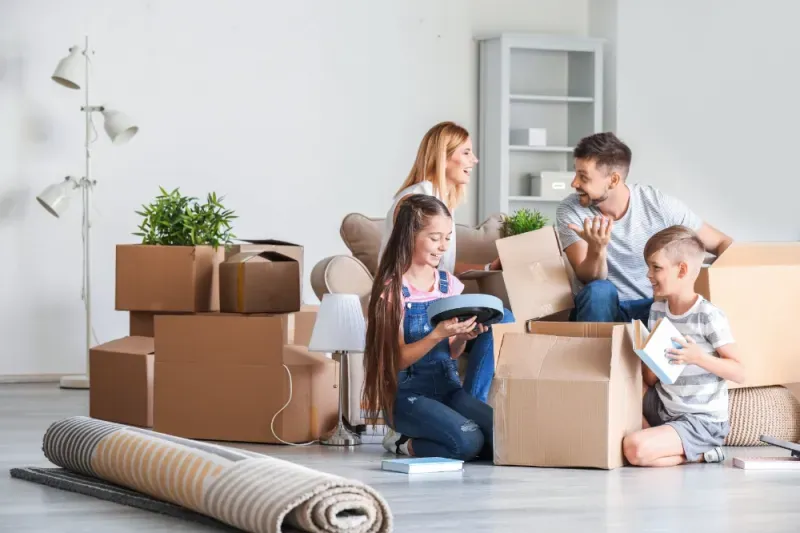 Happy family celebrating their new house